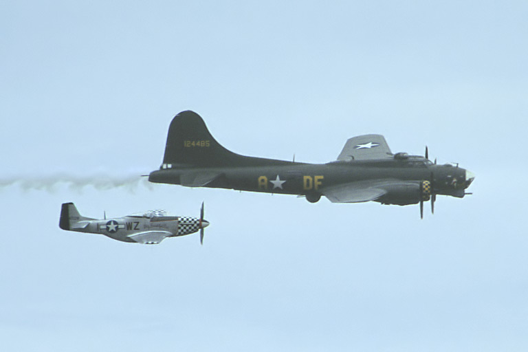 B-17G Flying Fortress G-BEDF "Sally B" & CAC CA-18 Mustang Mk.22 G-HAEC "Big Beautiful Doll"