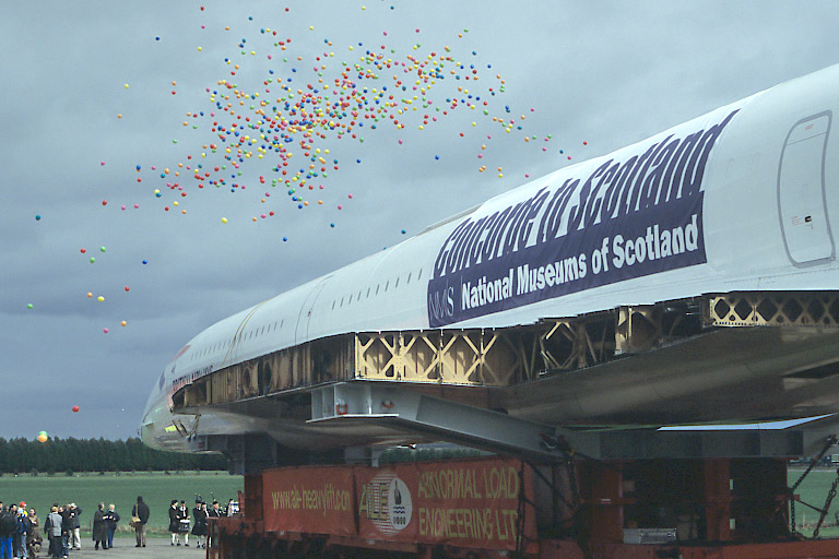 The balloons go up as Concorde arrives at the Museum of Flight. The balloons go up.